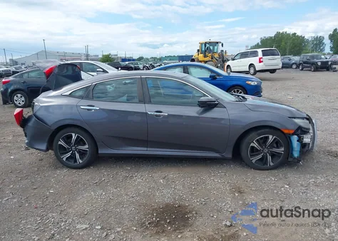 2016 Honda Civic Touring from USA, damaged, VIN 2HGFC1F9XGH631536